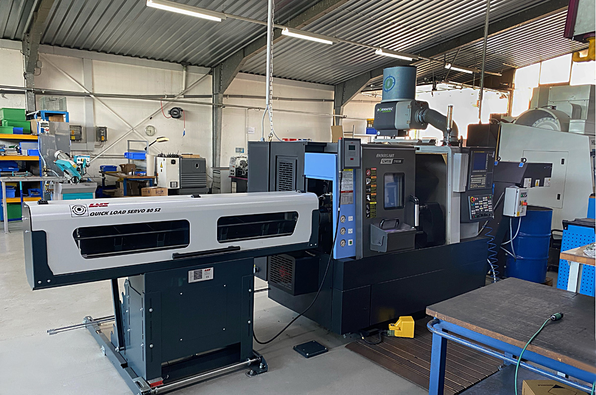 Doosan Lynx 2100 mit Stangenlader