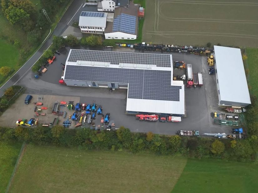 Company premises with tractors and vehicles