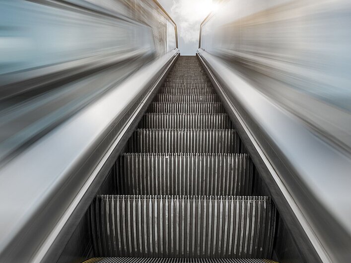 Kettensystem für Fahrtreppen