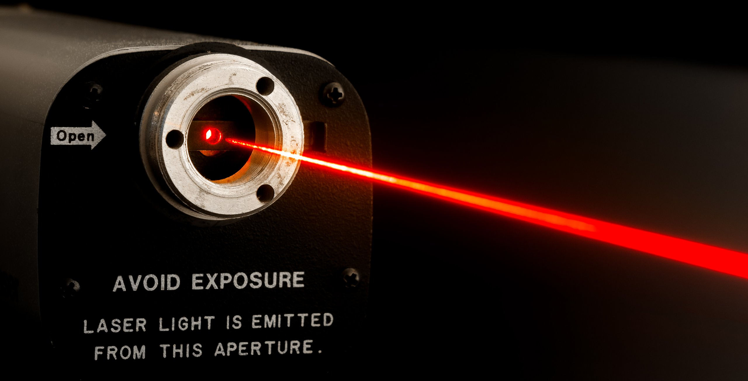 Laser personalization system for polycarbonate cards