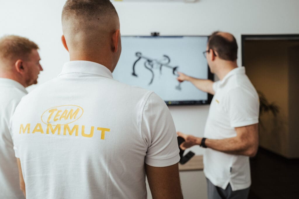 Teambesprechung über technische Weiterentwicklungen