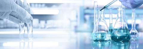 Laboratory setup with test tubes and Erlenmeyer flasks