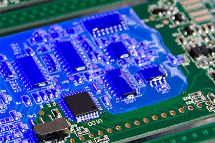 Selectively coated assembly with UV varnish