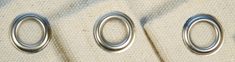 Curtain eyelet machine