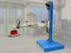 Lift column with articulated jib arm, mechanical gripper and forklift-movable base plate