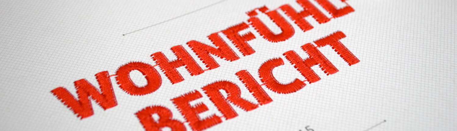 Report with embroidery "Wohnfühlbericht"