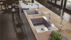 Kitchen sink with tap