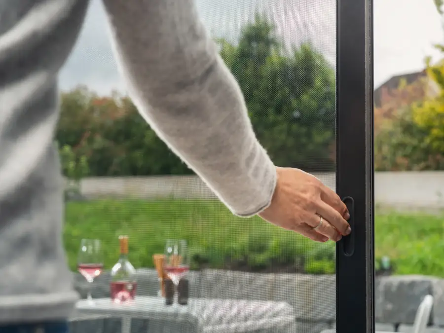 Pleated insect screen on balcony door