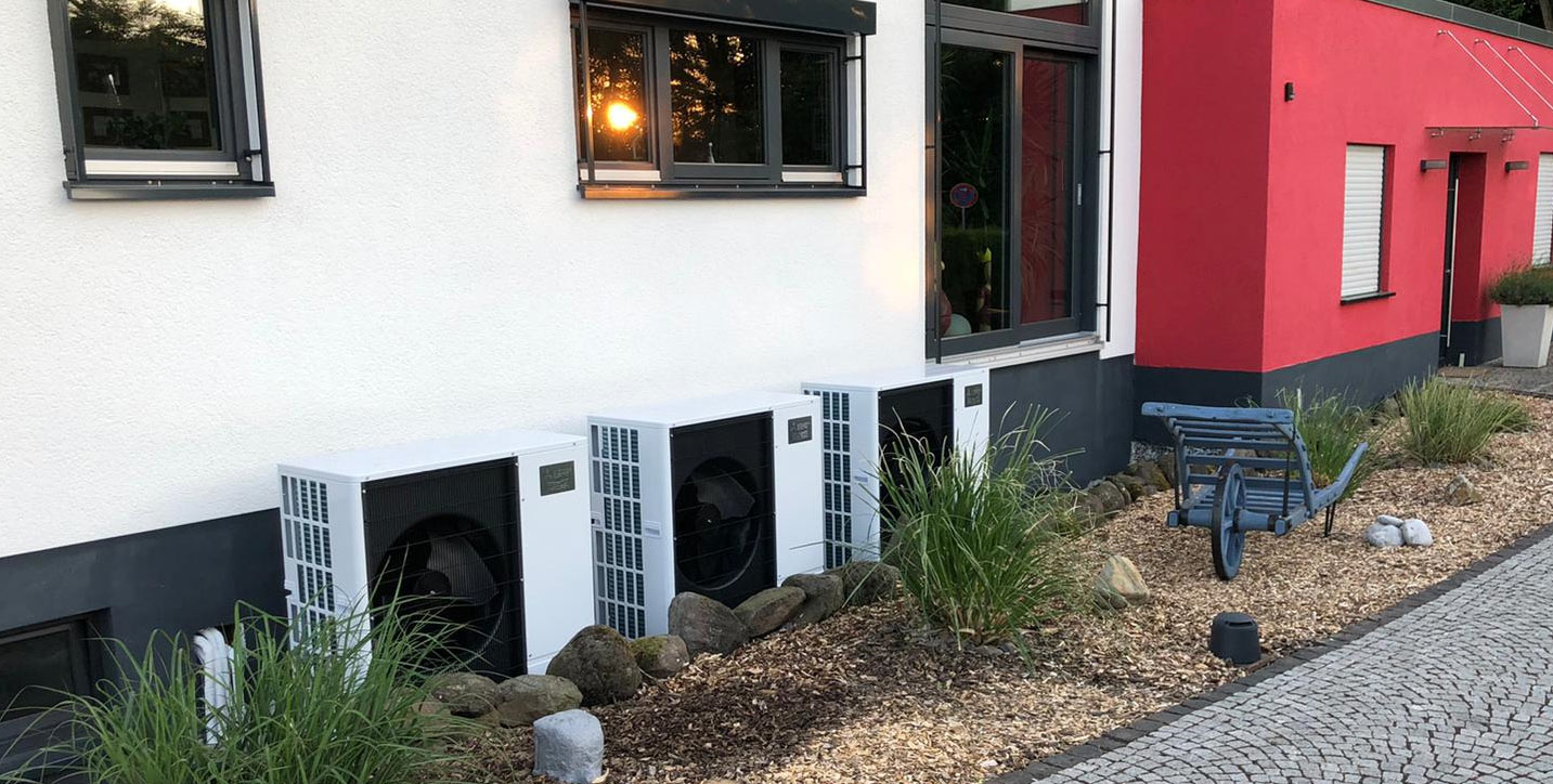 Heat pump system on a multi-family building