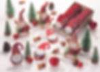 Weihnachtsmänner und Tannenbäume auf Schokotalern