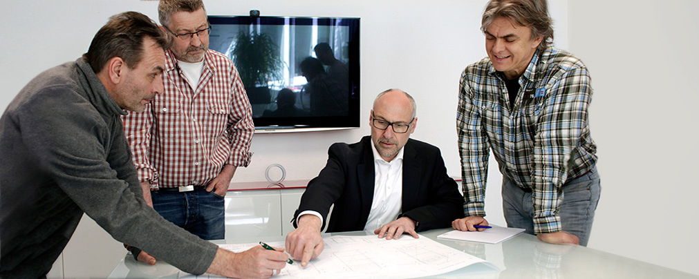 Team im Beratungsgespräch
