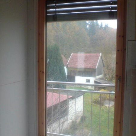 Alufenster mit Zirbenholz