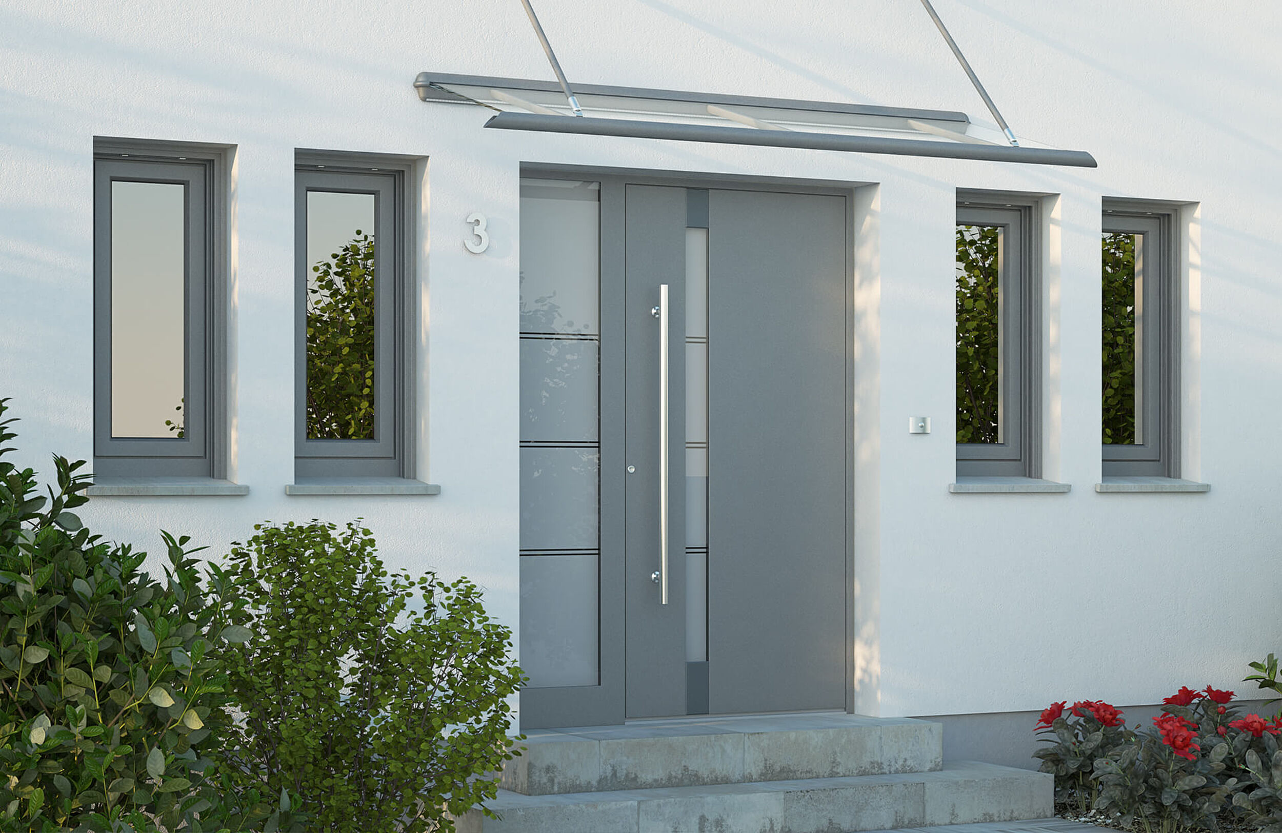 Fenster und Haustür mit Vordach