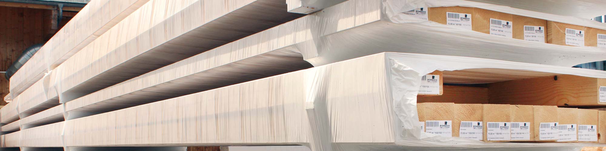 Foil-wrapped solid structural timber