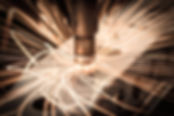 Laserschneiden eines Metallbauteils