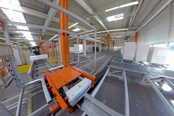 Buchwagenentladung an der Reifenbaumaschine