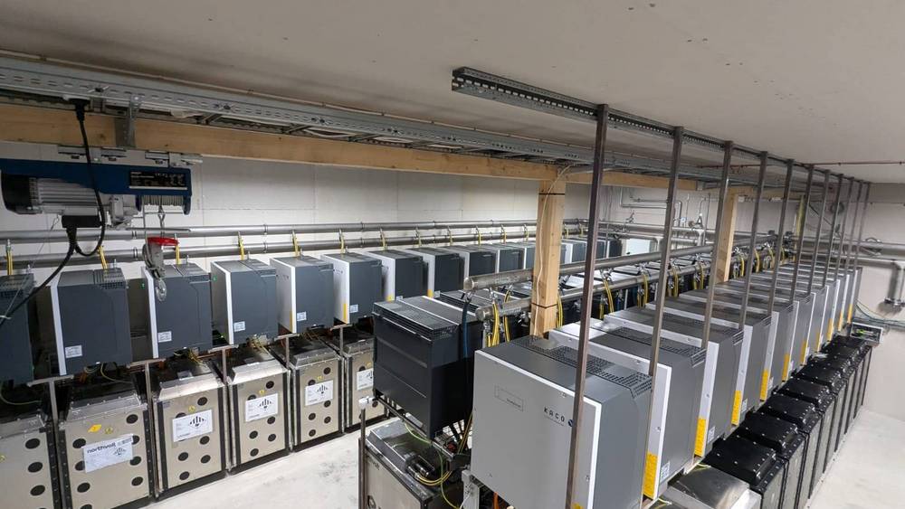 Technical room with battery storage systems and inverters
