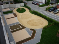 Surface surfacing with path construction, small-sett paving and slabs (daycare centre Görlitz)