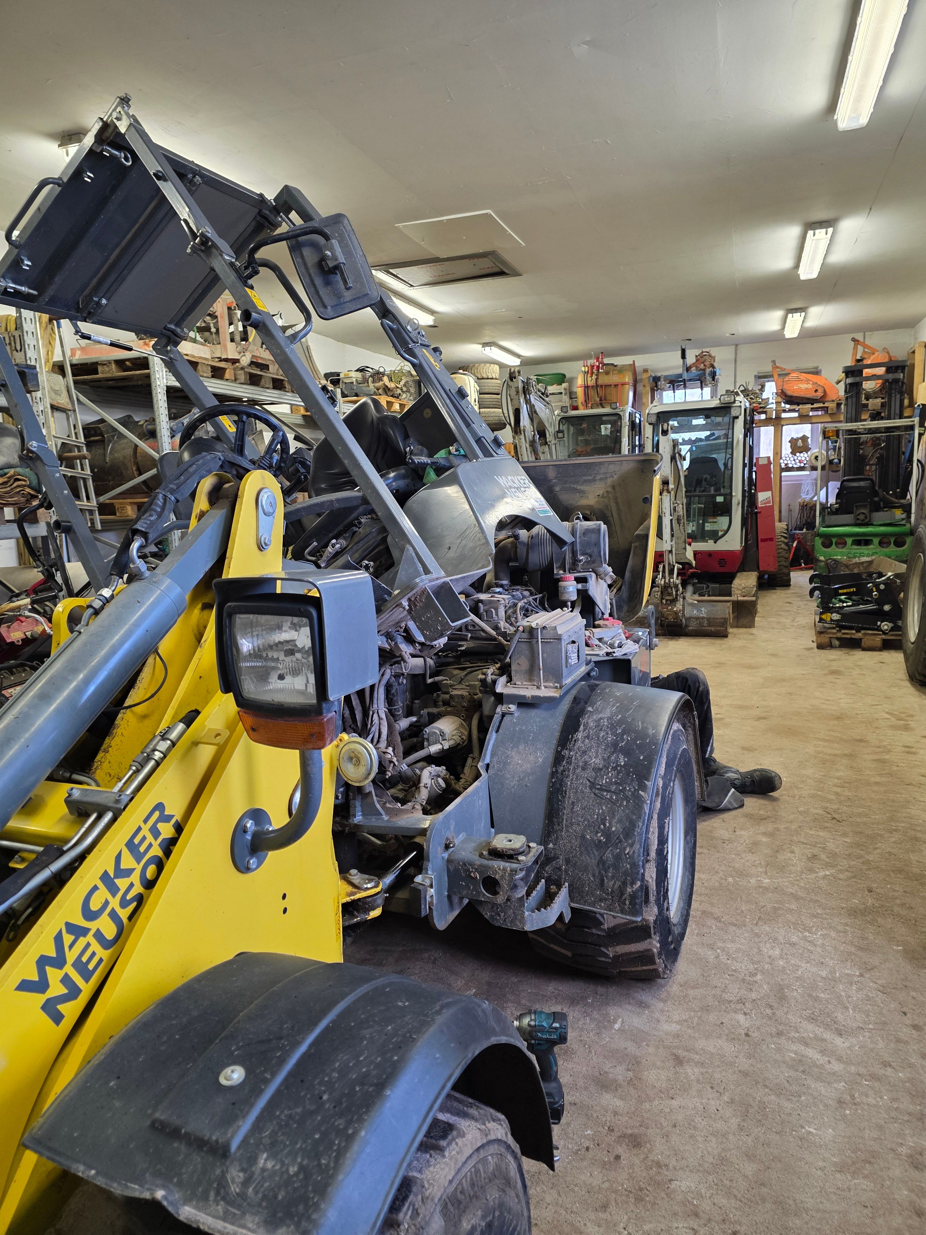Wartung einer Baumaschine