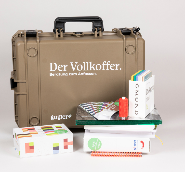Vollkoffer mit Papier-, Farbmustern und Druckbeispielen