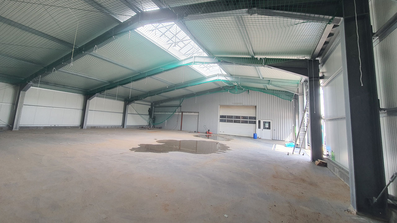 Neubau Industriehalle an Bestand, Neumünster