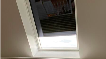 Dachfenster mit Sonnenschutz