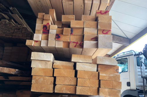 Planks, boards and squared timber