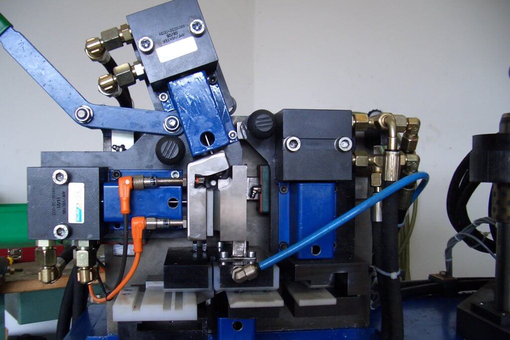 Punching system for roller shutter boxes