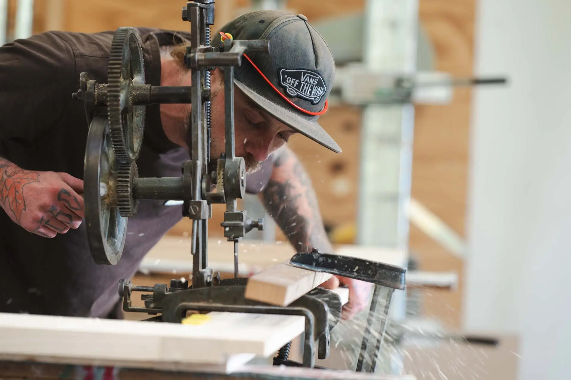 Employee sawing