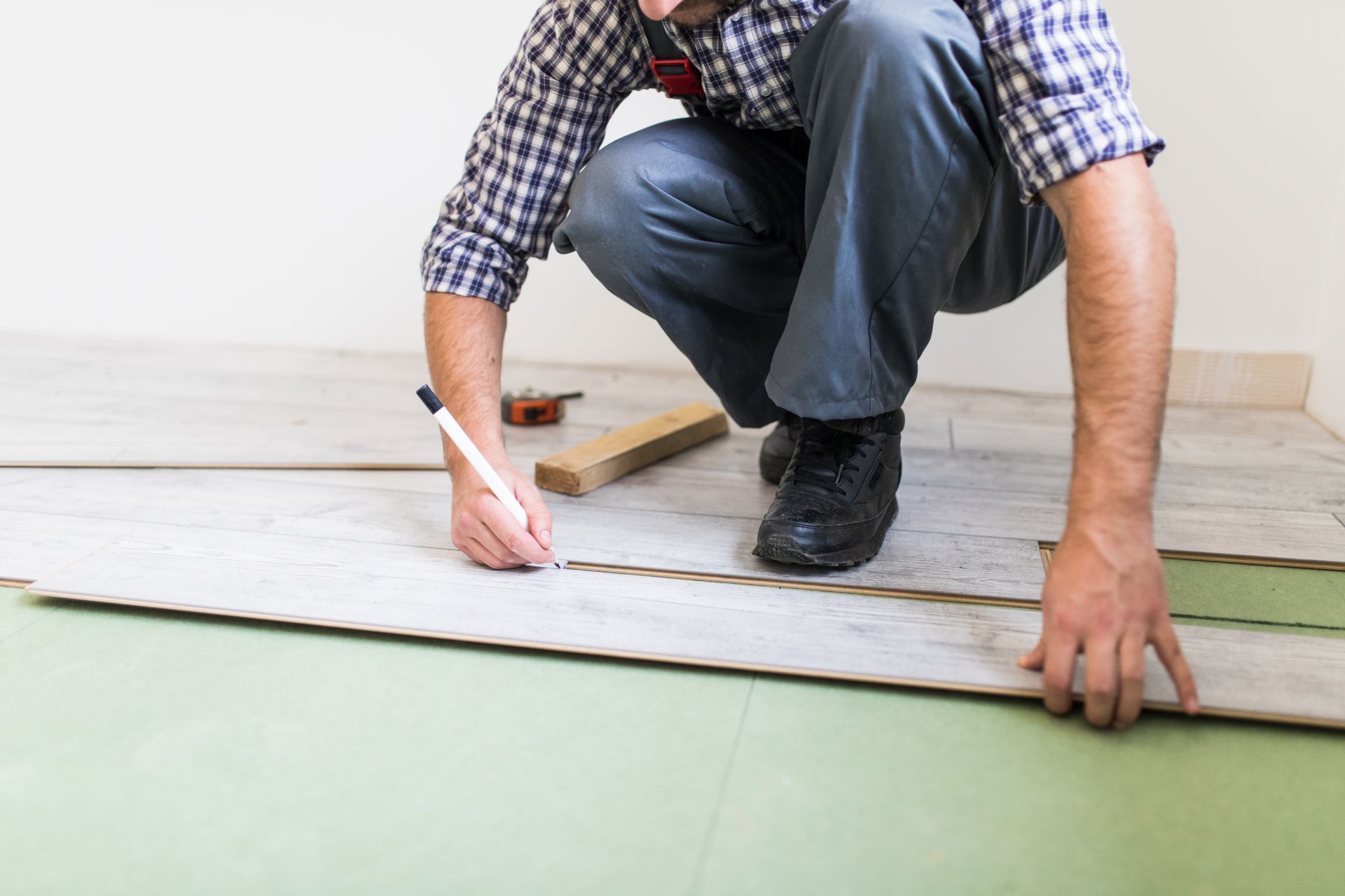 Floor installer at work