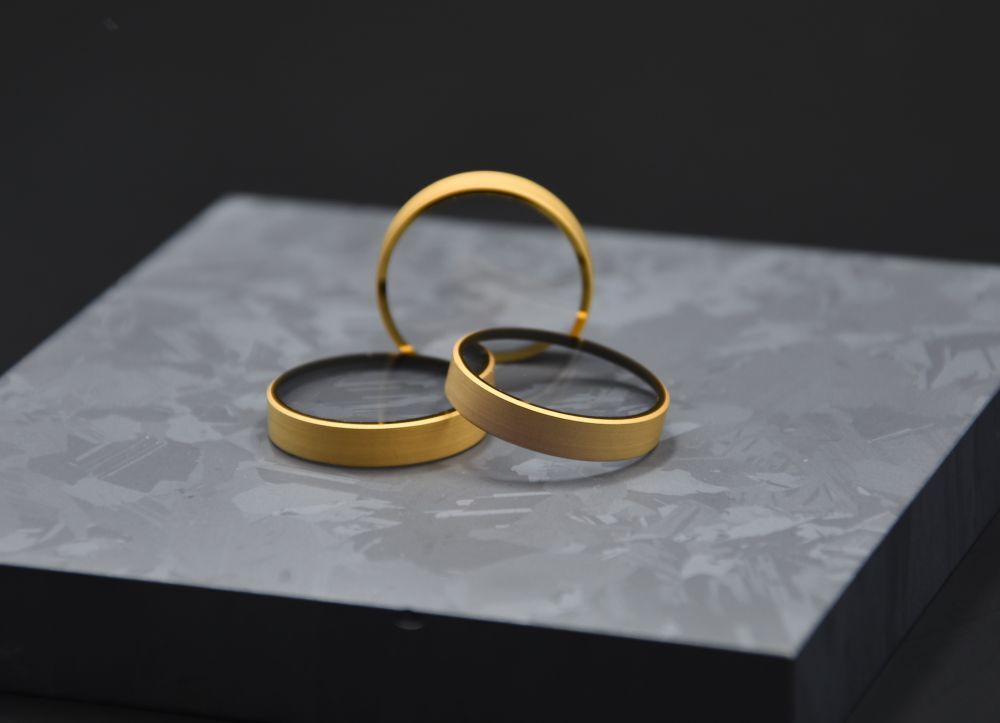 Teilweise metallisierte Optiken