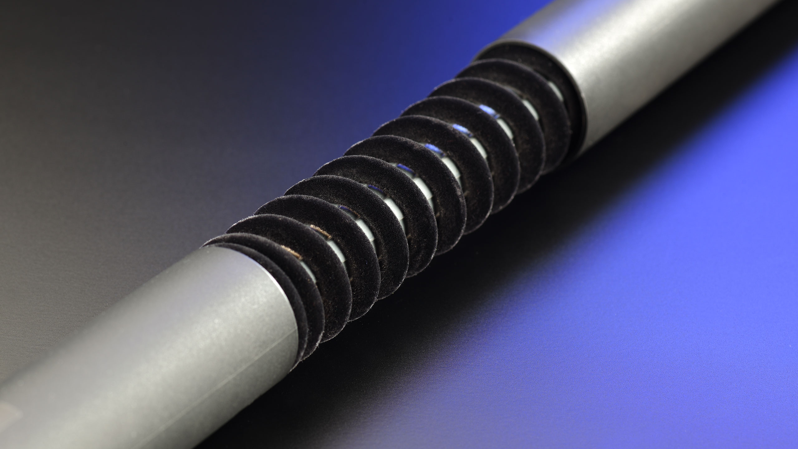 Flocked compression spring