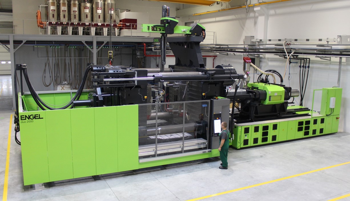 Injection molding machine in production