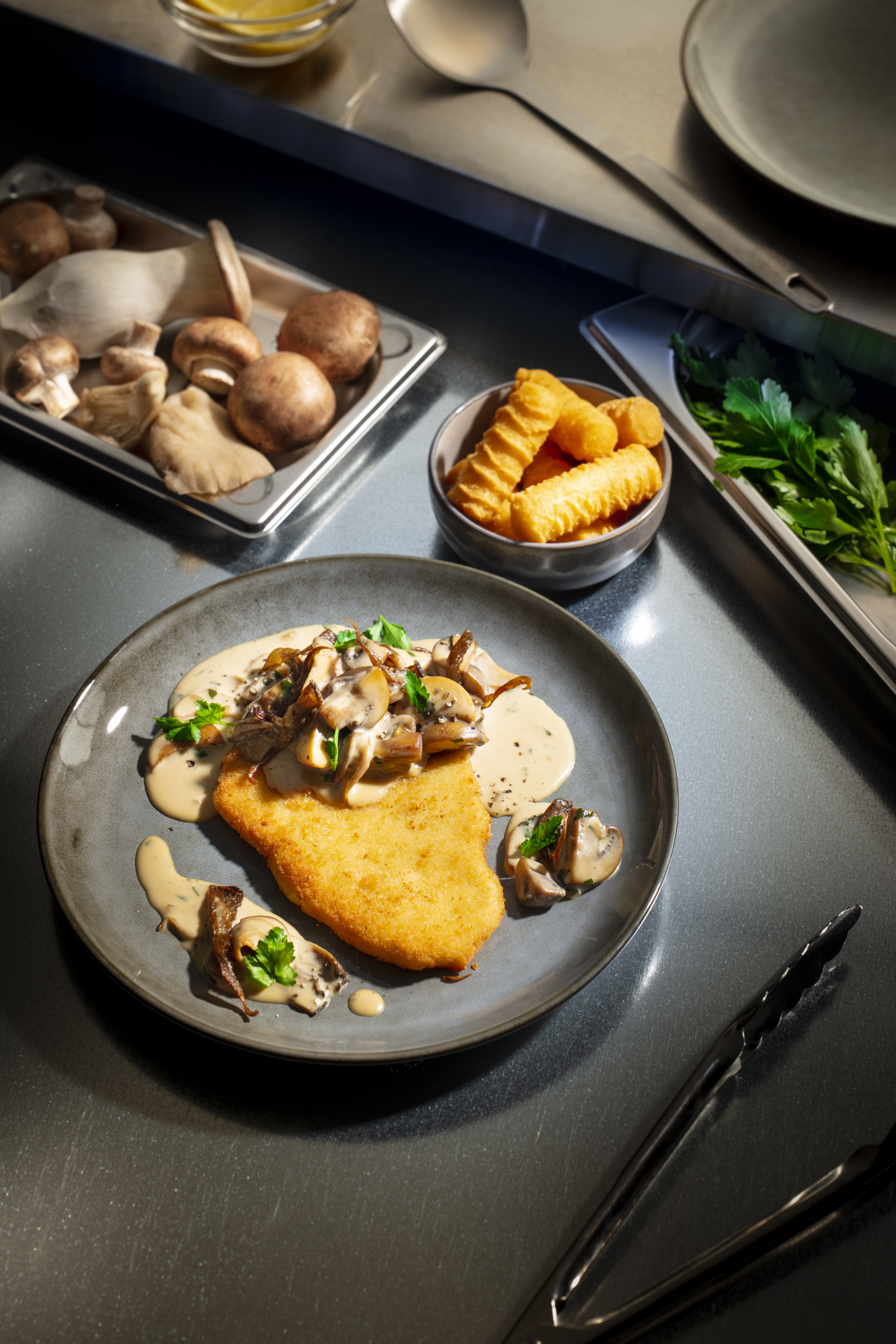 Schnitzel vom Feld 150 g mit Pilzen