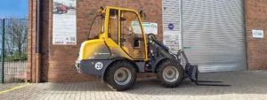 Eurotrac W12 Miniradlader mit Kabine und Frontlader