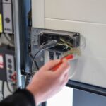 Wartung einer Feststellanlage nach DIN 14677