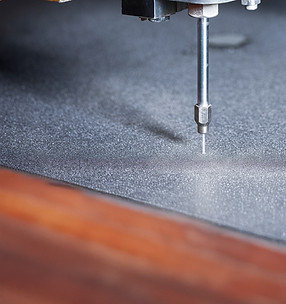 Pure-water cutting of sensitive materials