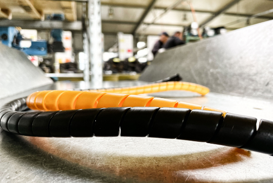 Hydraulikschlauchleitung mit Schlauchschutz