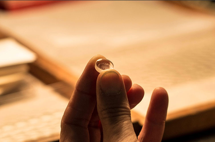 Intermediate and final inspection of optical lenses
