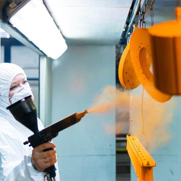 Surface coating apprentice at work