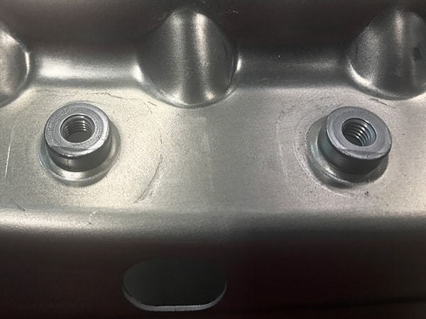 Joining elements: press-fitting of nuts