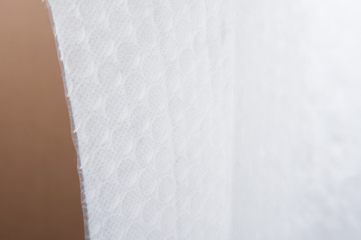 Air cushion film with non-woven lamination